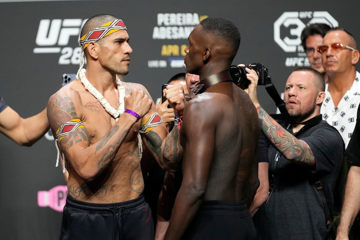 Poatan enfrenta a Adesanya en el pesaje ceremonial del UFC 287: «Voy a ponerle una correa»